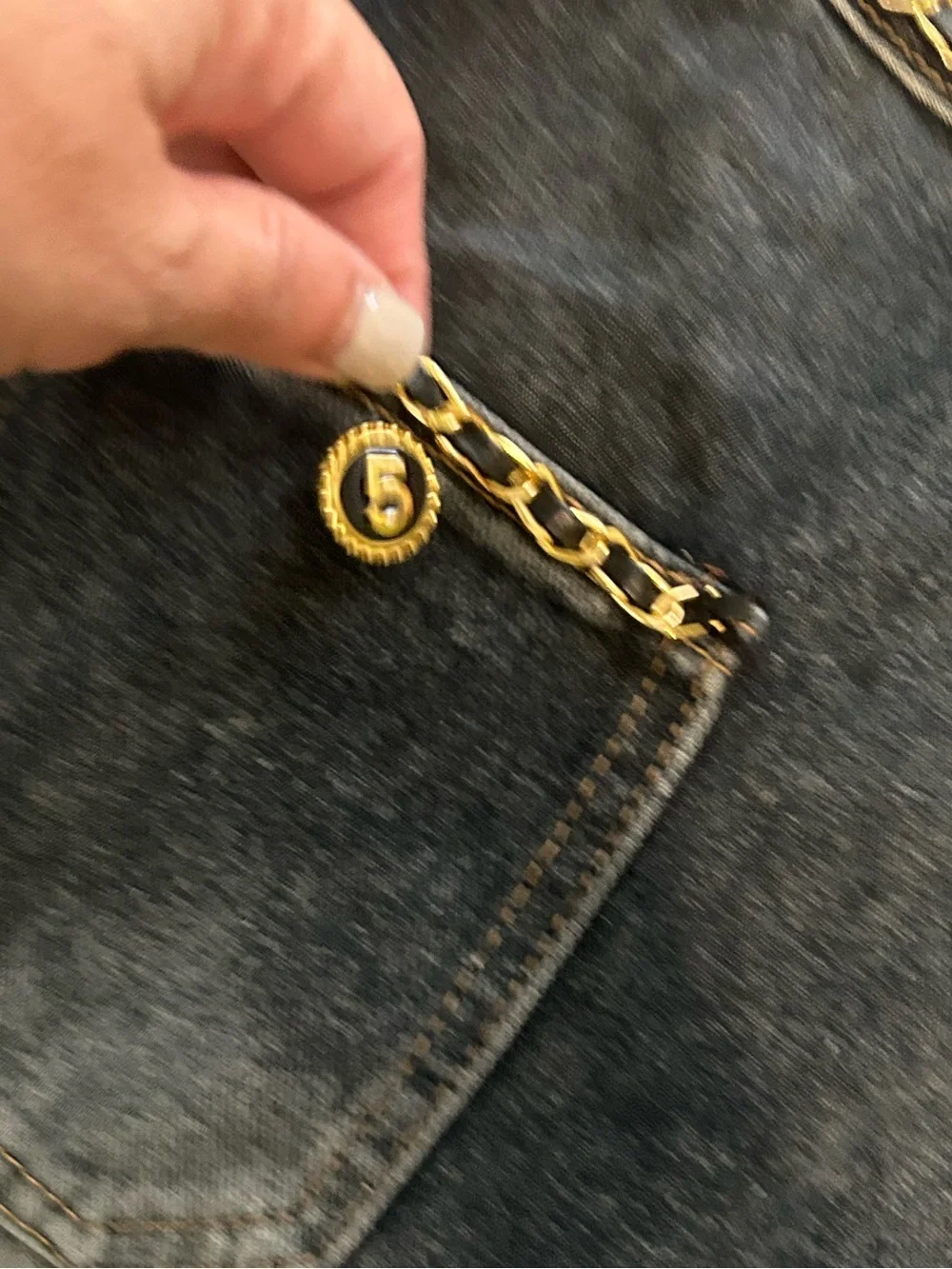 CHANEL Dark Blue Denim Jeans with Gold Chain Trim